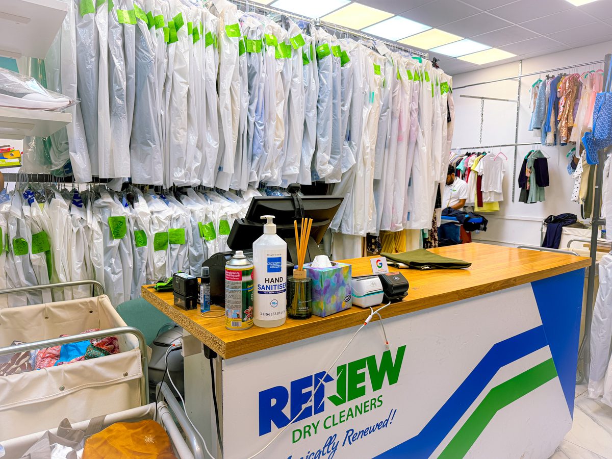 Inside Renew Drycleaners, finished garments on the rail at the Nine Elms shop